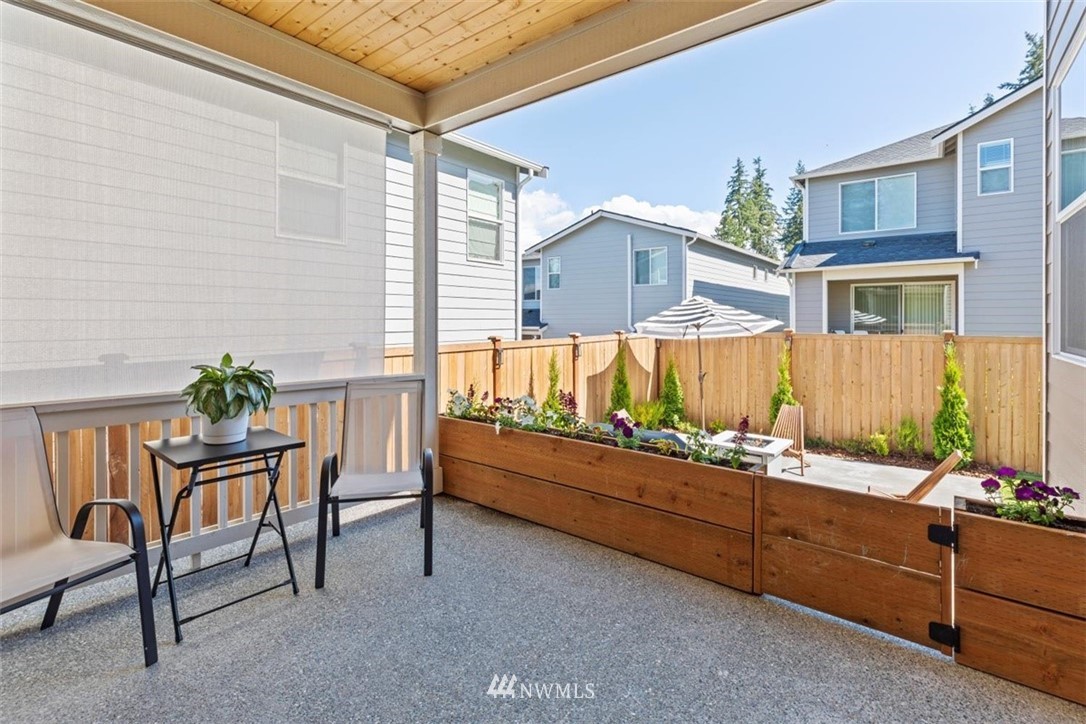 320 181st Street Southeast Bothell, WA 98012 - Photo 32 of 40 a bed room with a bed and chair