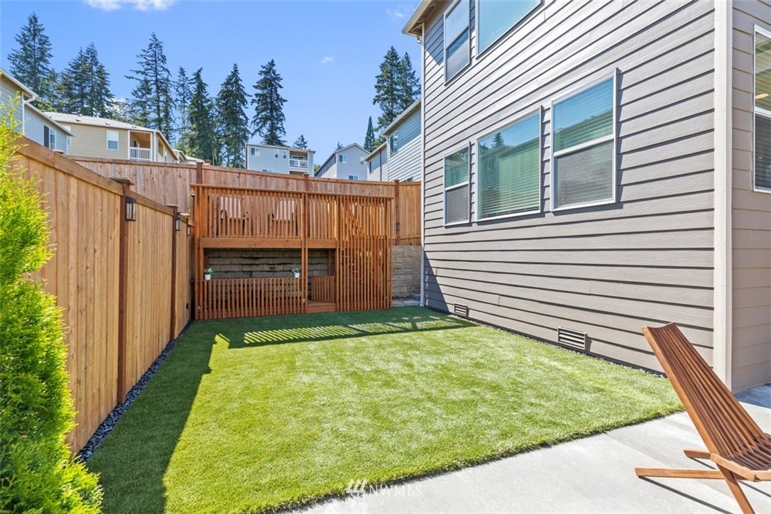 320 181st Street Southeast Bothell, WA 98012 - Photo 35 of 40 a view of a backyard with wooden fence