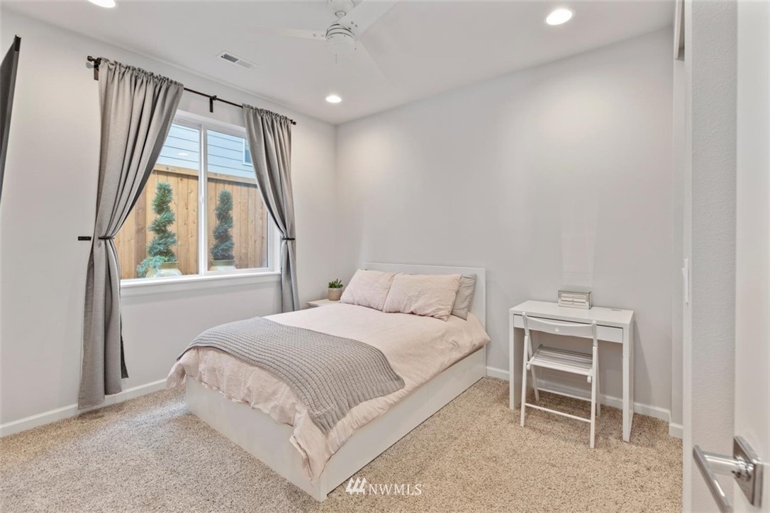 320 181st Street Southeast Bothell, WA 98012 - Photo 6 of 40 a bedroom with a bed and a window