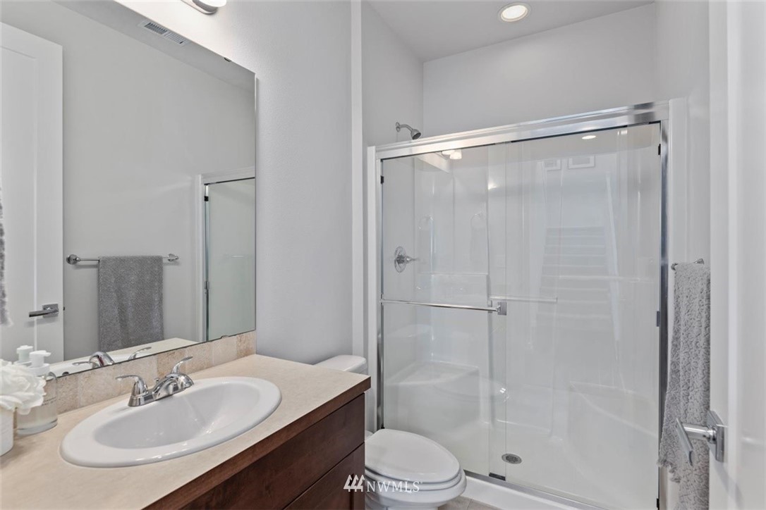 320 181st Street Southeast Bothell, WA 98012 - Photo 7 of 40 a bathroom with a sink toilet and shower
