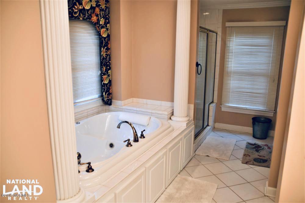 296 Vine Swamp Road Kinston, NC 28504 - Photo 12 of 15 His and Her Vanities with whirlpool