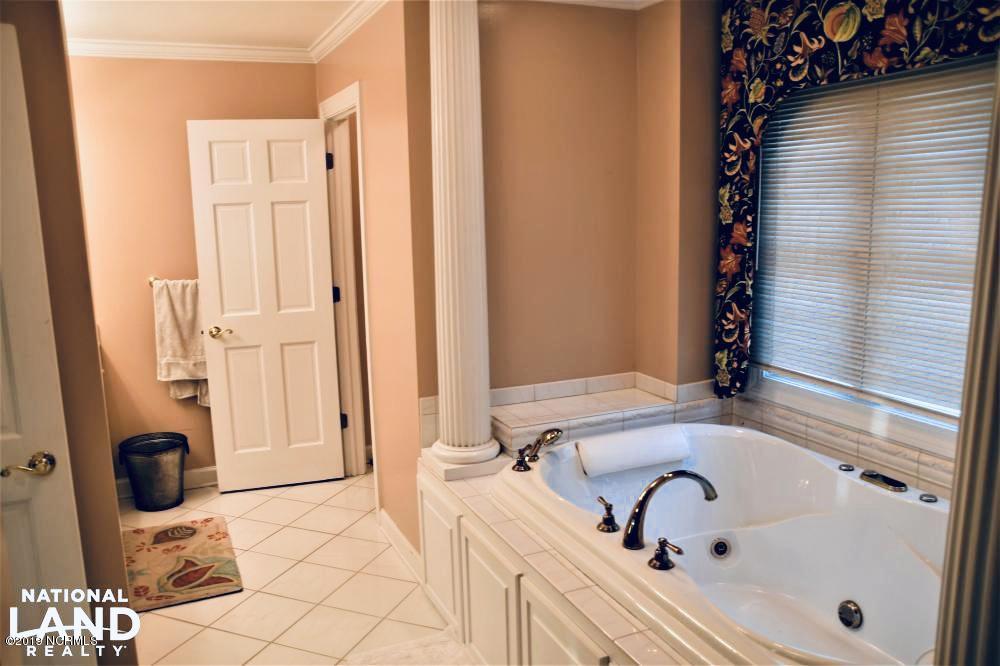 296 Vine Swamp Road Kinston, NC 28504 - Photo 13 of 15 His and Her Vanities with whirlpool