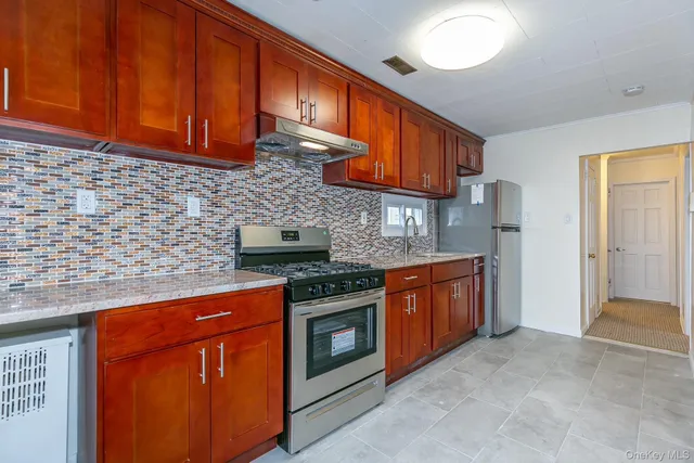 $1,330,000 | 46-20 190th Street | Auburndale