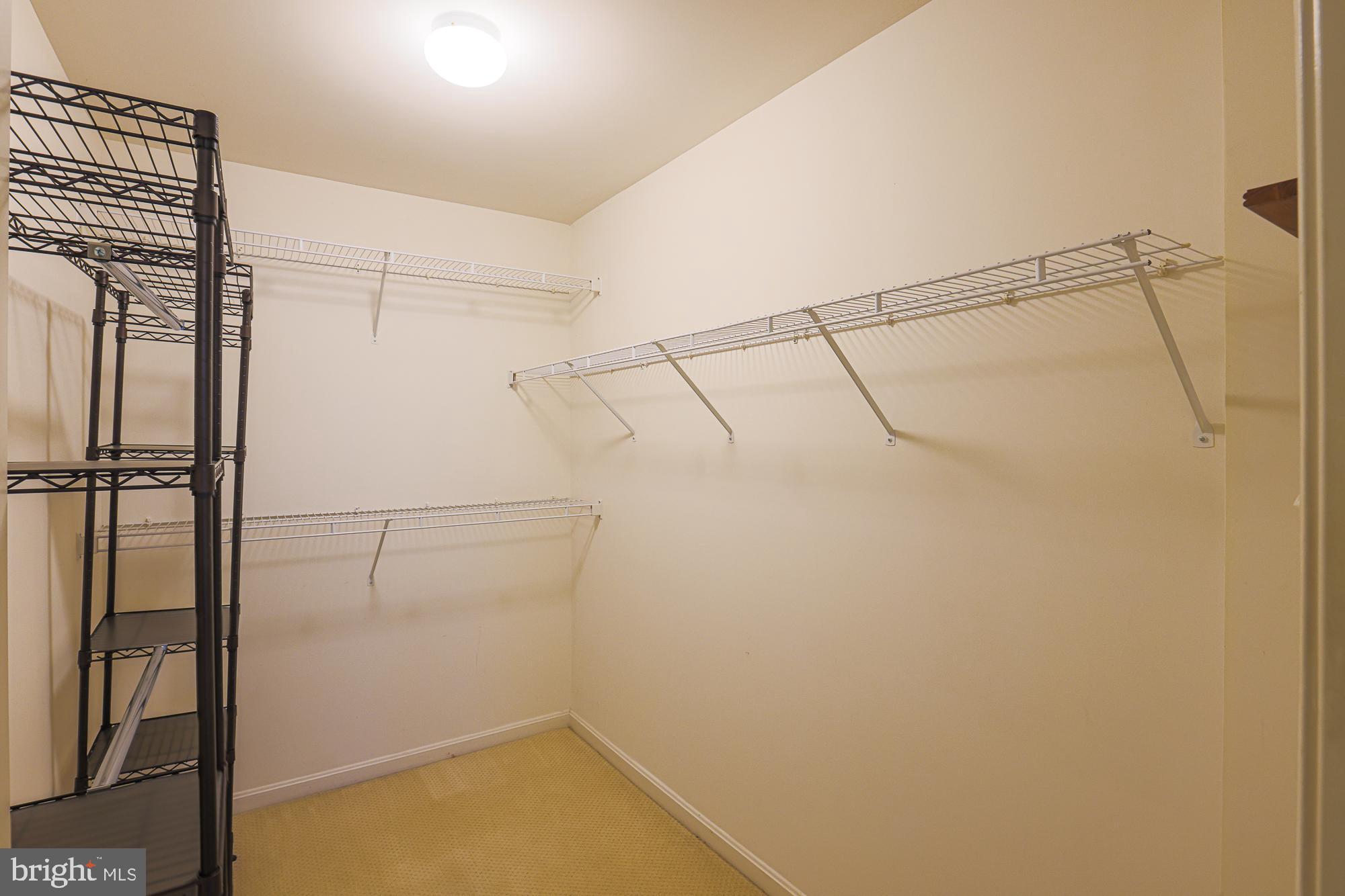 9500 Sidebrook Road, Unit 209 Owings Mills, MD 21117 - Photo 12 of 23 Master bedroom walk in closet