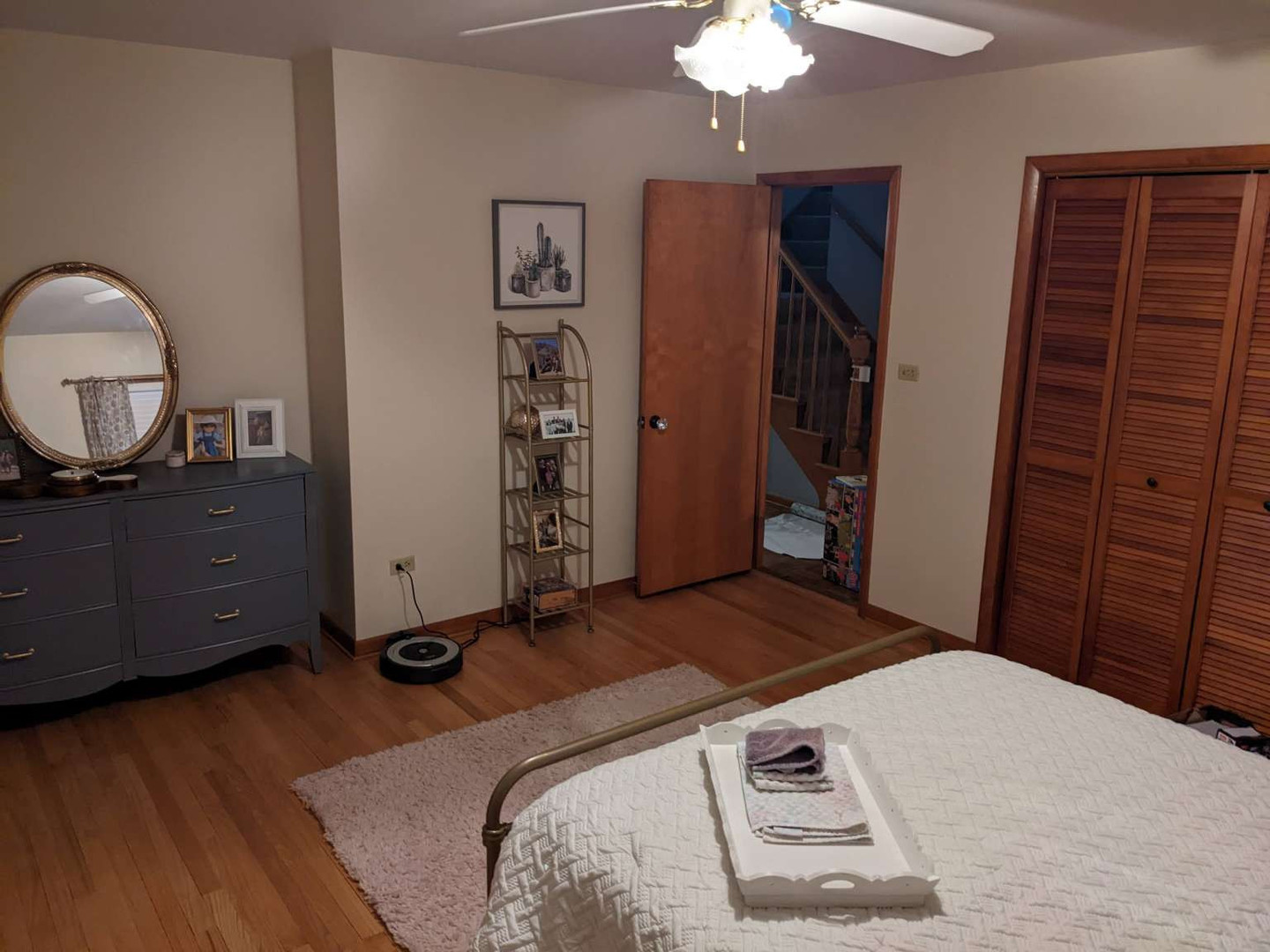 N352 Willow Road Wheaton, IL 60187 - Photo 13 of 25 a bedroom with a bed and a dresser