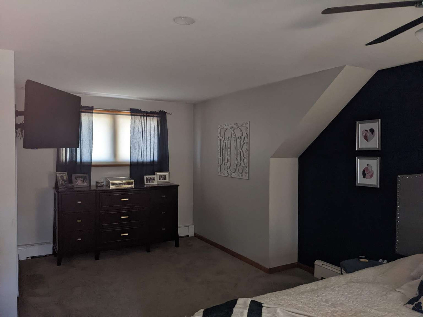 N352 Willow Road Wheaton, IL 60187 - Photo 15 of 25 a room with furniture and a flat screen tv