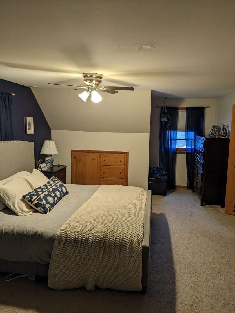 N352 Willow Road Wheaton, IL 60187 - Photo 16 of 25 a bedroom with a bed and window