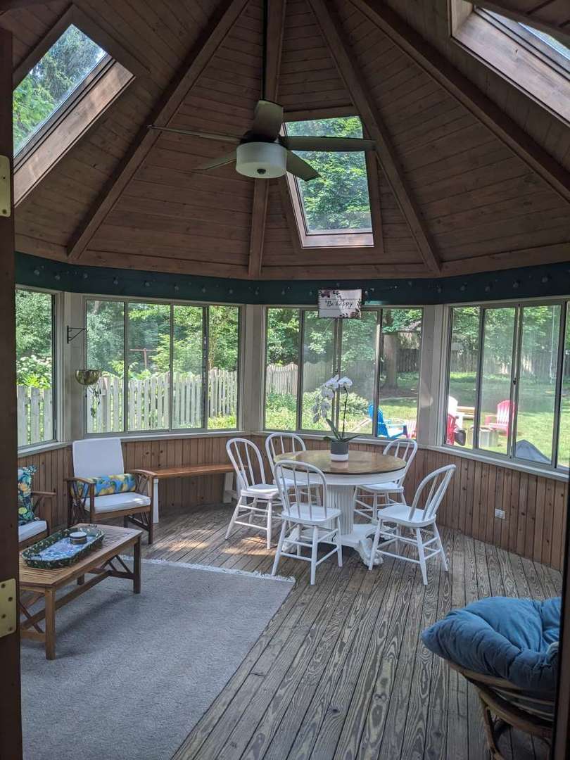 N352 Willow Road Wheaton, IL 60187 - Photo 19 of 25 a dining room with furniture and wooden floor
