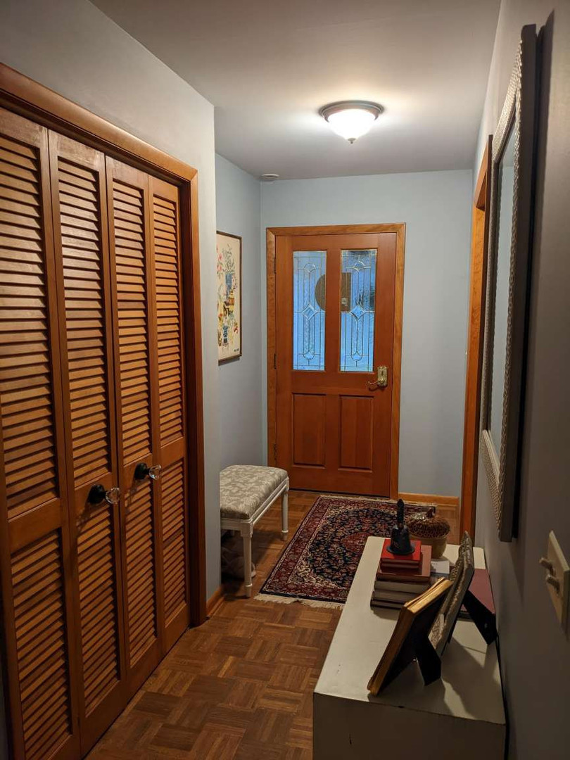 N352 Willow Road Wheaton, IL 60187 - Photo 2 of 25 a living room with furniture and a window