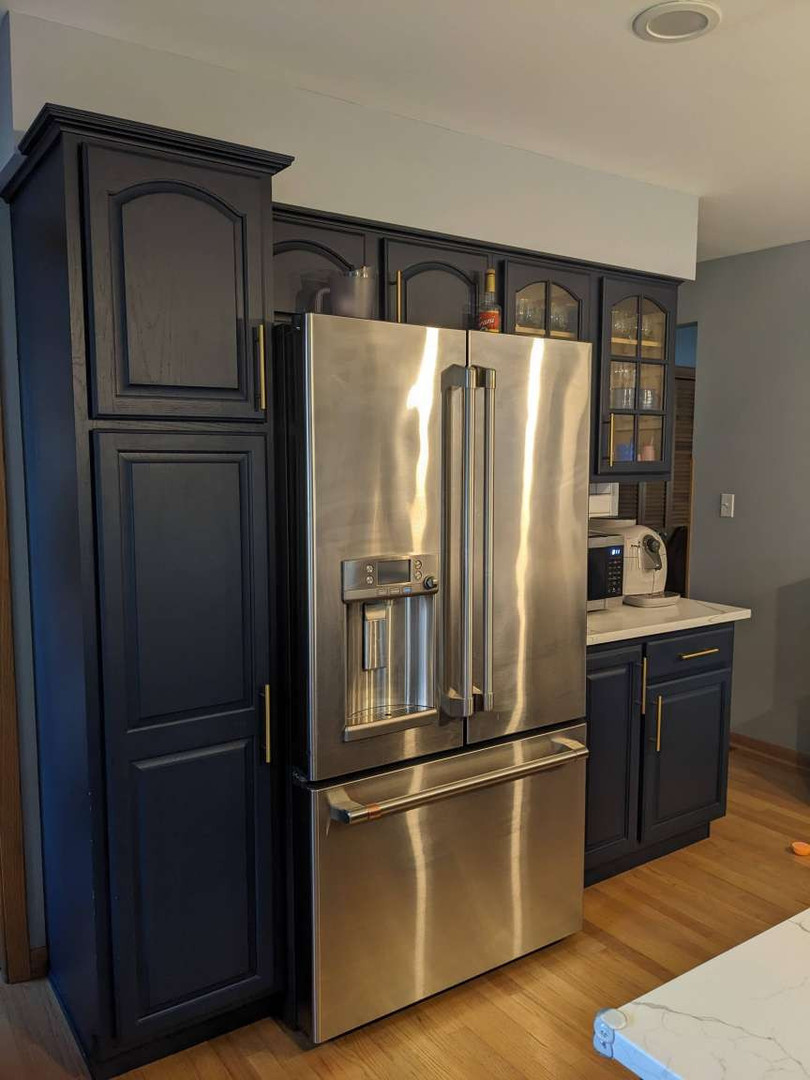 N352 Willow Road Wheaton, IL 60187 - Photo 8 of 25 a metallic refrigerator freezer sitting in a kitchen