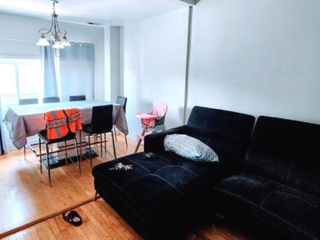 Undisclosed Address Chicago, IL 60641 - Photo 8 of 20 a living room with furniture rug and wooden floor