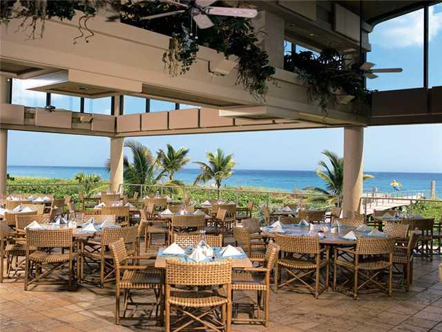 3000 Southeast Island Point Lane Stuart, FL 34996 - Photo 18 of 25 a view of a chairs and table in a patio