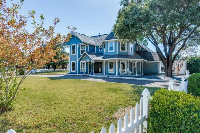 a front view of a house with swimming pool
