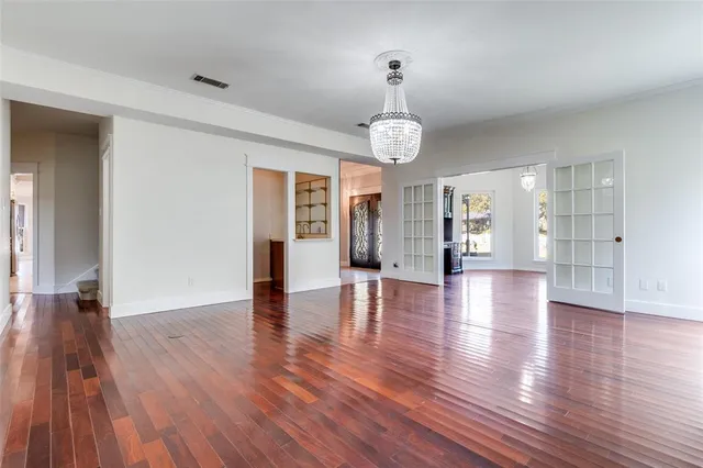 a view of a livingroom with wooden floor