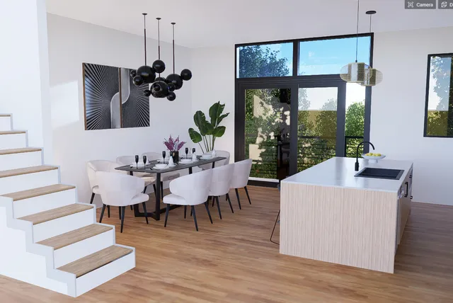 a view of kitchen with furniture and wooden floor