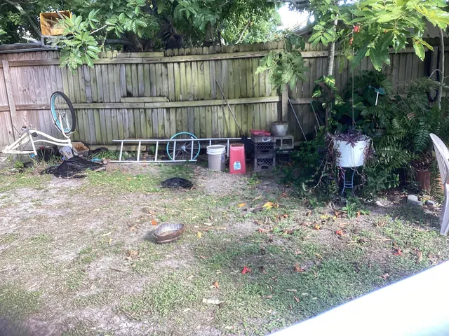 a view of a dinning table and chairs in patio