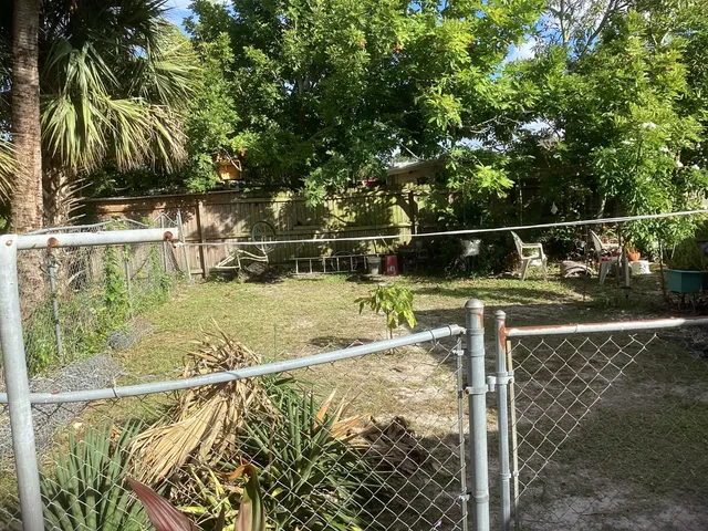 a view of swimming pool from a balcony