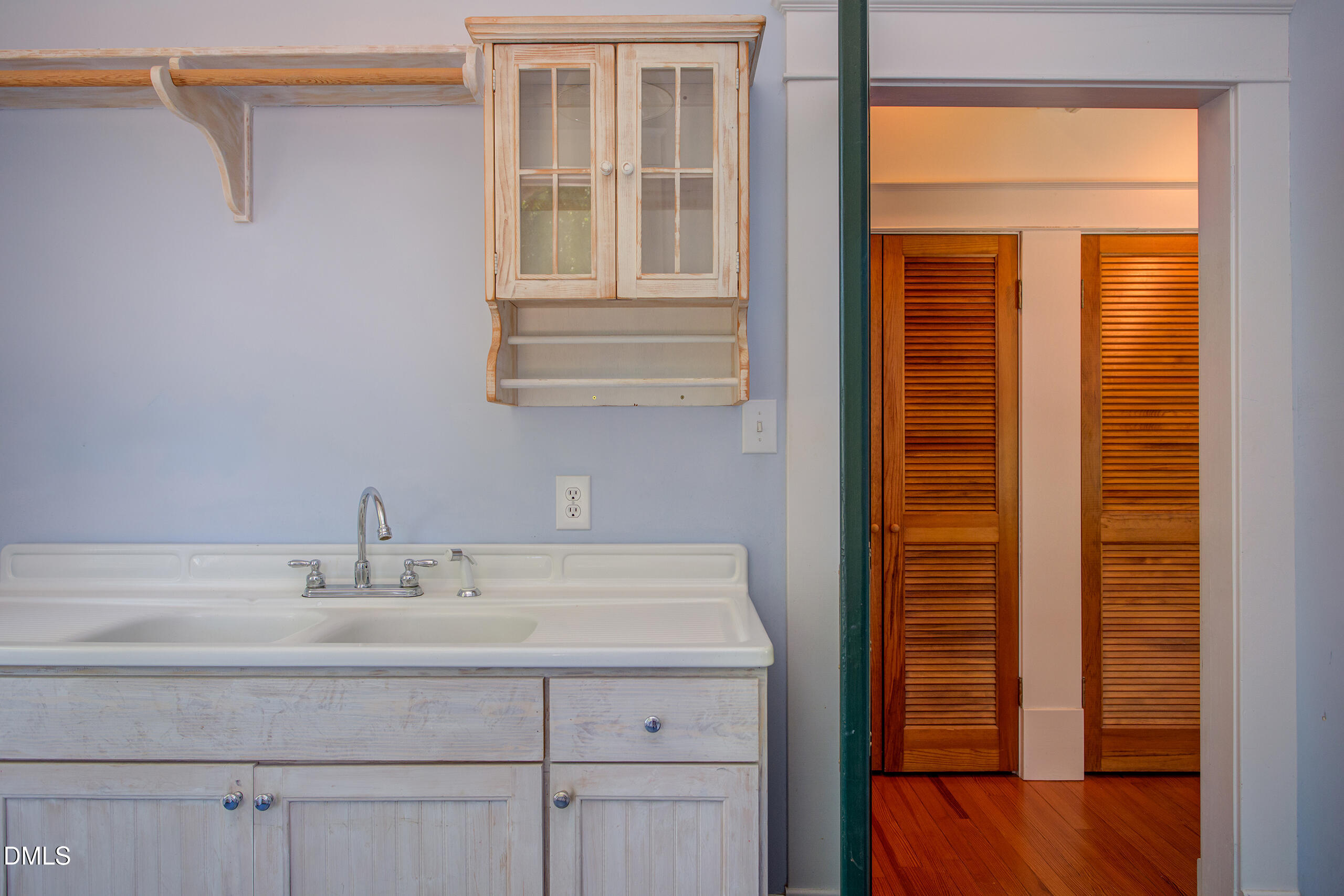 127 Forest Road Raleigh, NC 27605 - Photo 63 of 75 a bathroom with a sink and a mirror