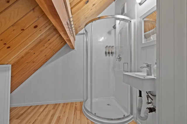a bathroom with a sink and toilet