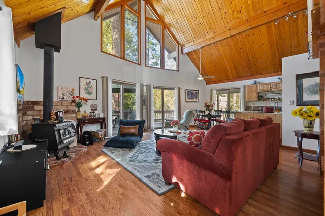a living room with furniture oven and a fireplace