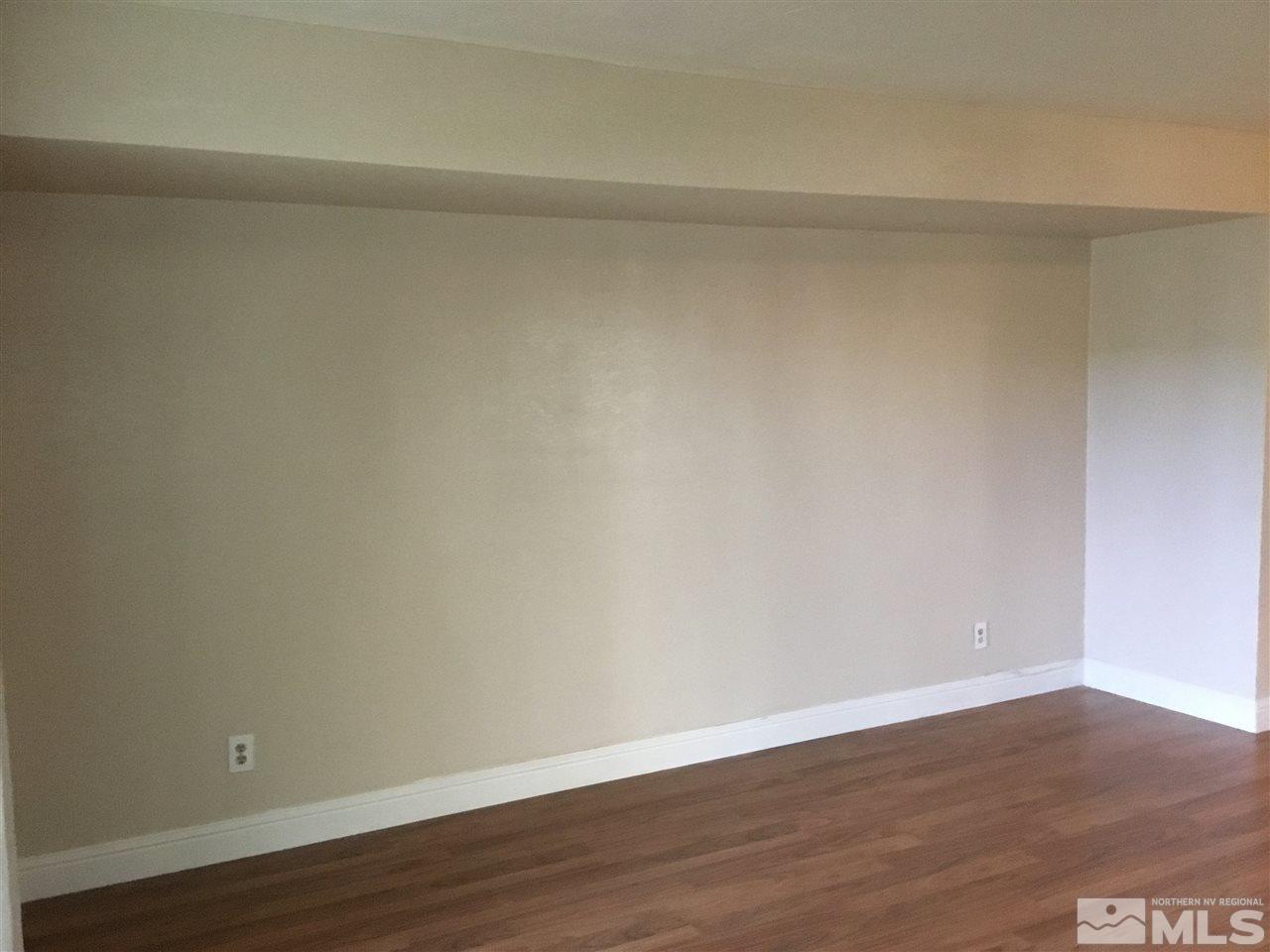 2366 Roundhouse Road Sparks, NV 89431 - Photo 5 of 13 a view of a room with wooden floor
