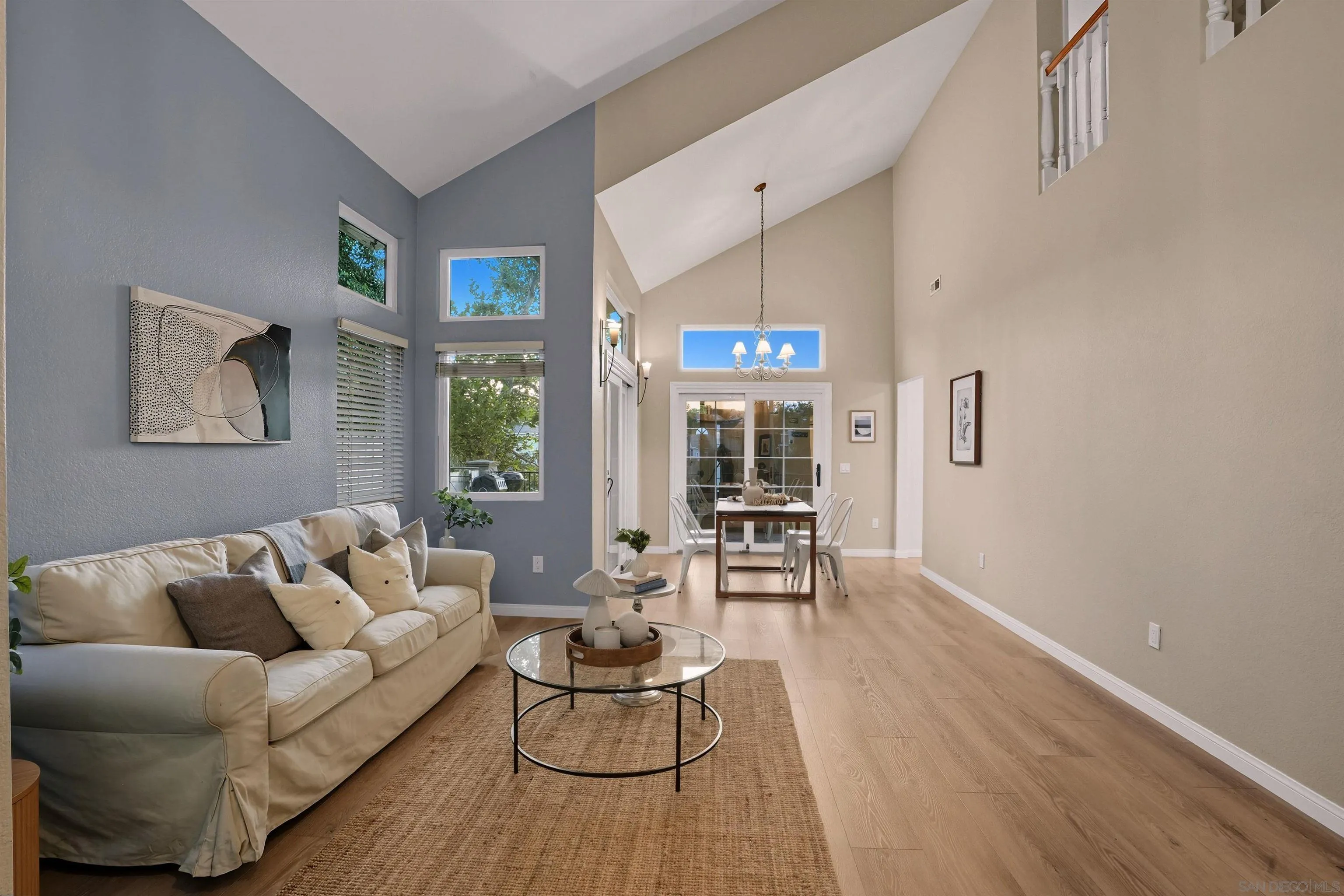 14704 Carmel Ridge Road San Diego, CA 92128 - Photo 6 of 22 a living room with furniture and a wooden floor