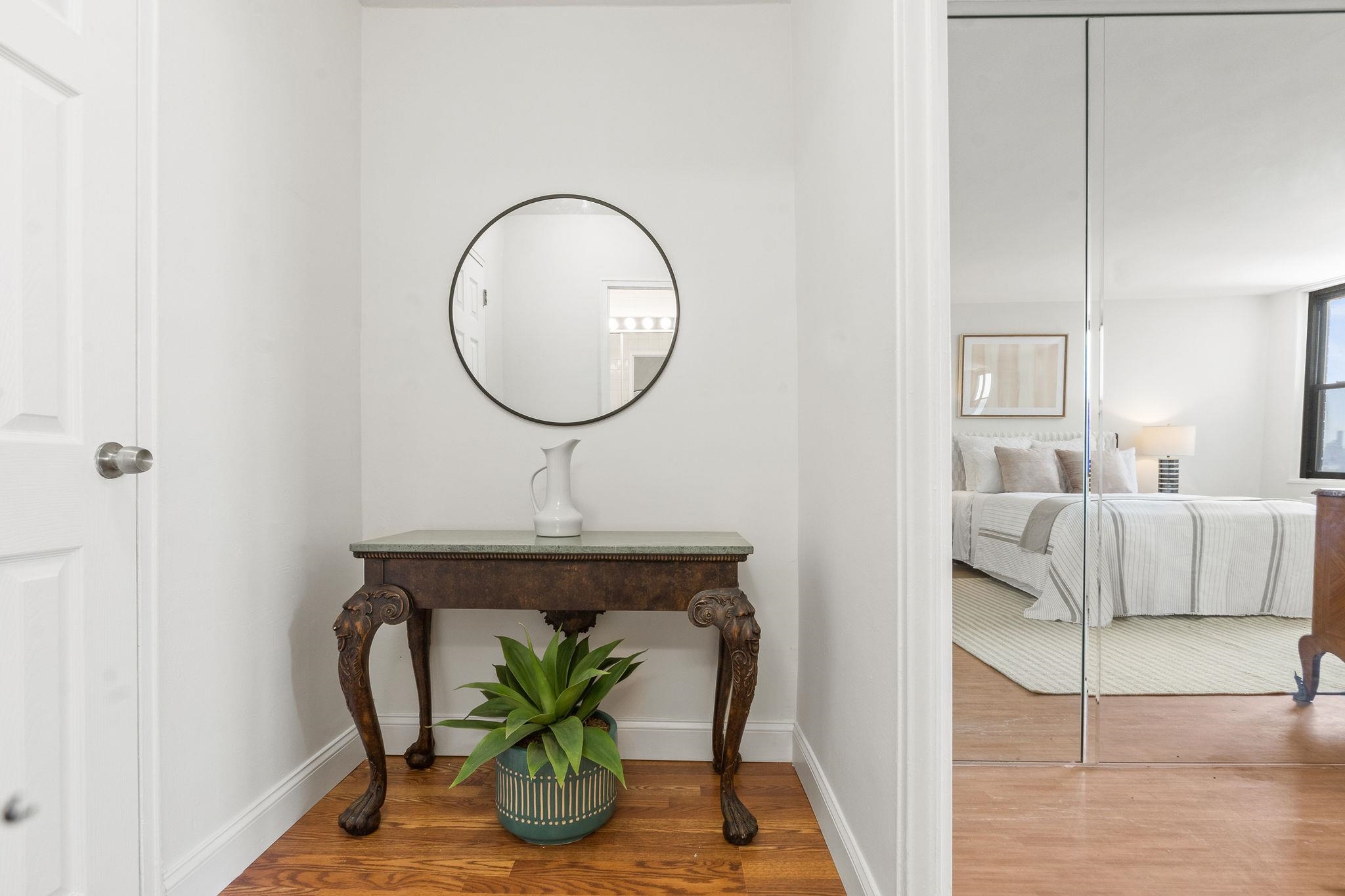 380 Mountain Road, Unit 1112 Union City, NJ 07087 - Photo 21 of 42 a living room with furniture and a potted plant
