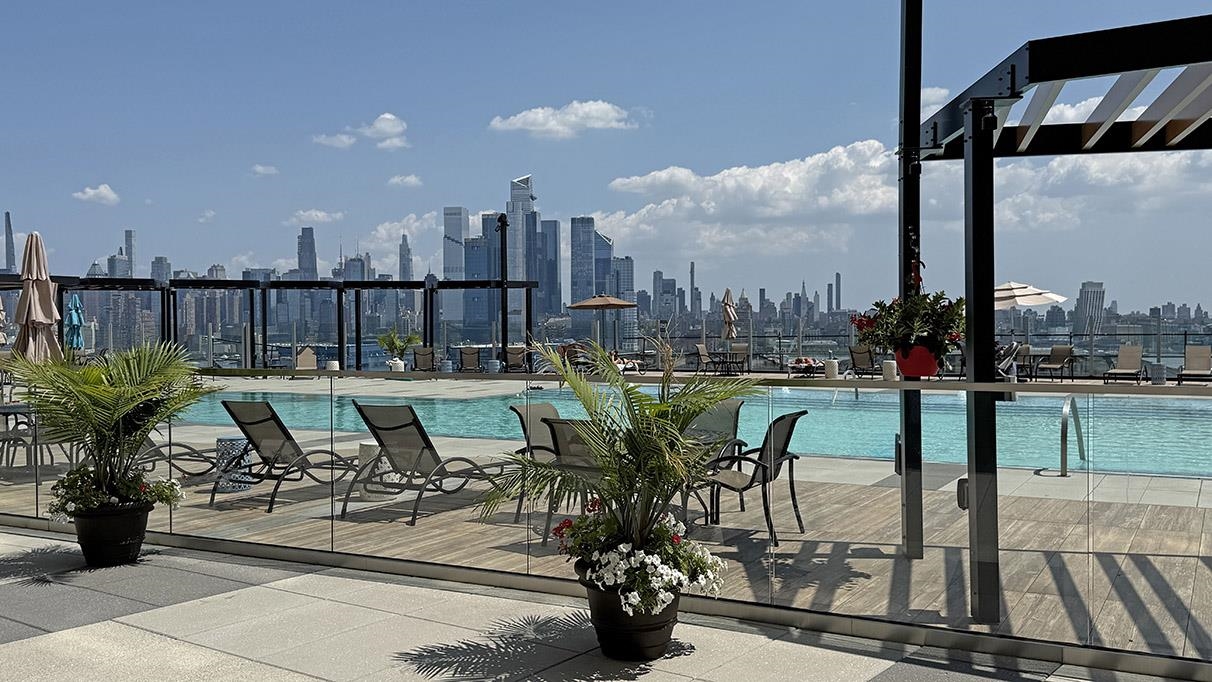 380 Mountain Road, Unit 1112 Union City, NJ 07087 - Photo 33 of 42 a view of a patio with chairs and plants