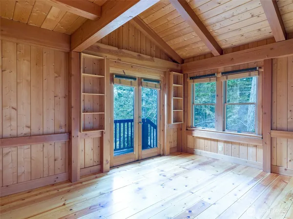 a bedroom with a bed and furniture