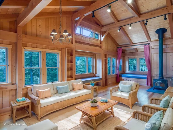 a outdoor living space with patio furniture and a large window