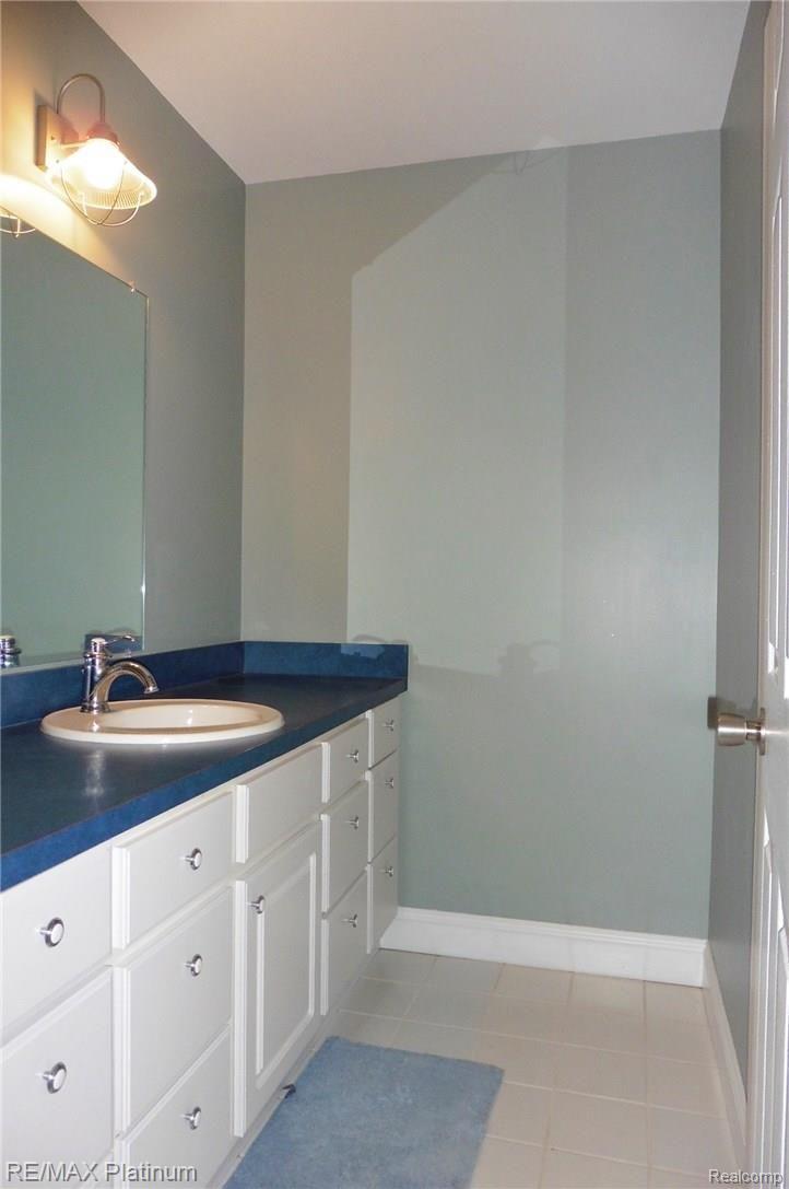 4884 Hinchey Road Howell, MI 48843 - Photo 23 of 39 2ndBedSink.JPG