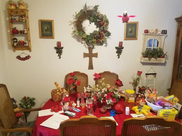 a bedroom with furniture and a painting on the wall
