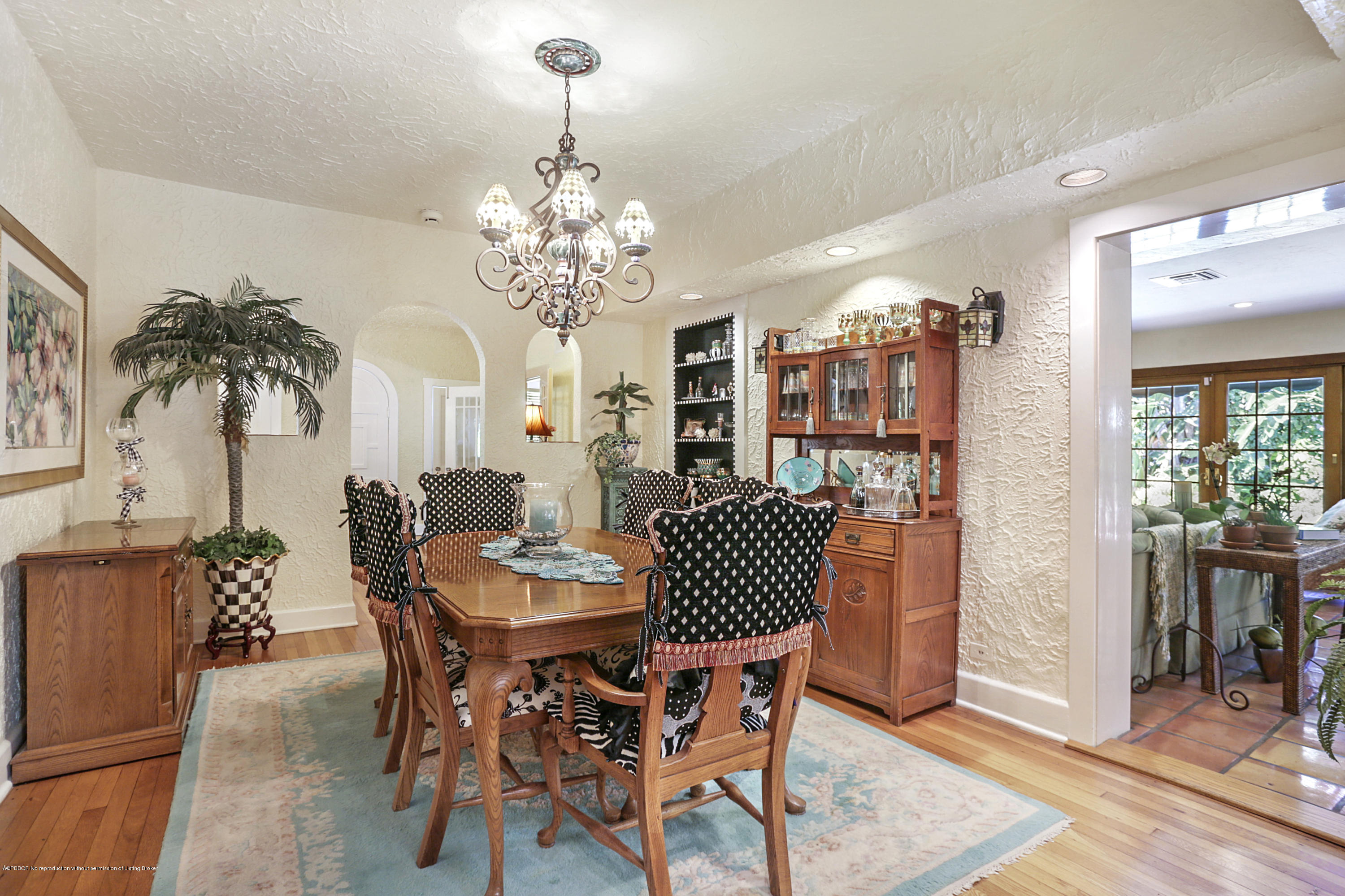 194 Almeria Road West Palm Beach, FL 33405 - Photo 14 of 25 a view of a dining room with furniture and chandelier