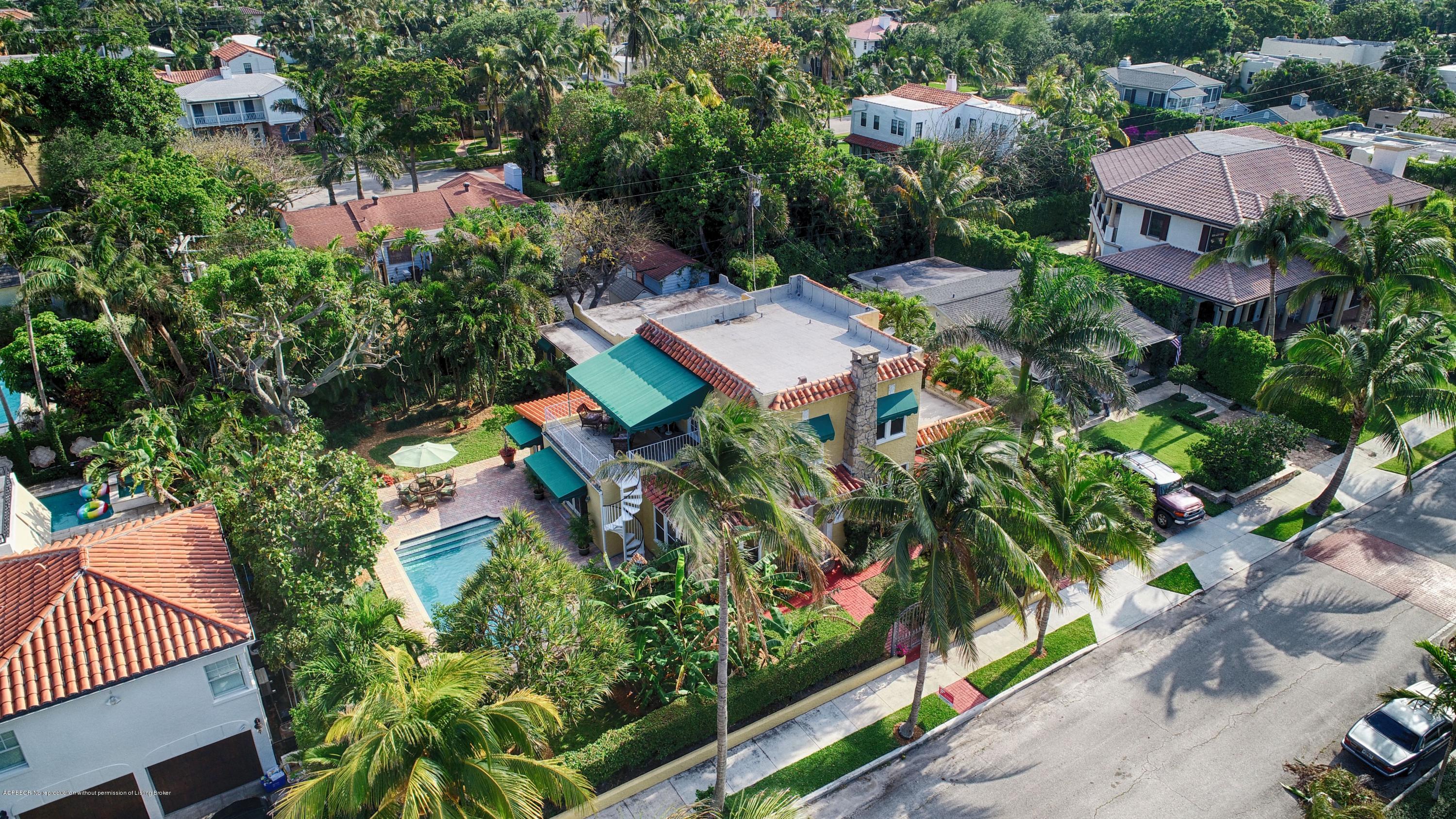 194 Almeria Road West Palm Beach, FL 33405 - Photo 3 of 25 an aerial view of a house with a yard and garden