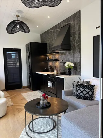 a kitchen with a table and chairs