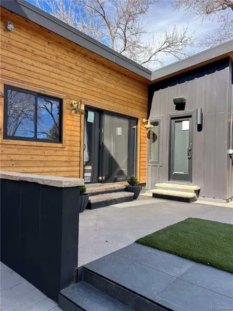 a view of a brick house with a street