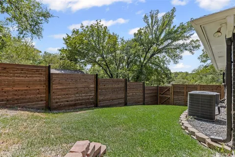 a view of a backyard with a potted plant