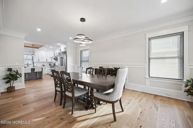 a stove top oven sitting inside of a kitchen