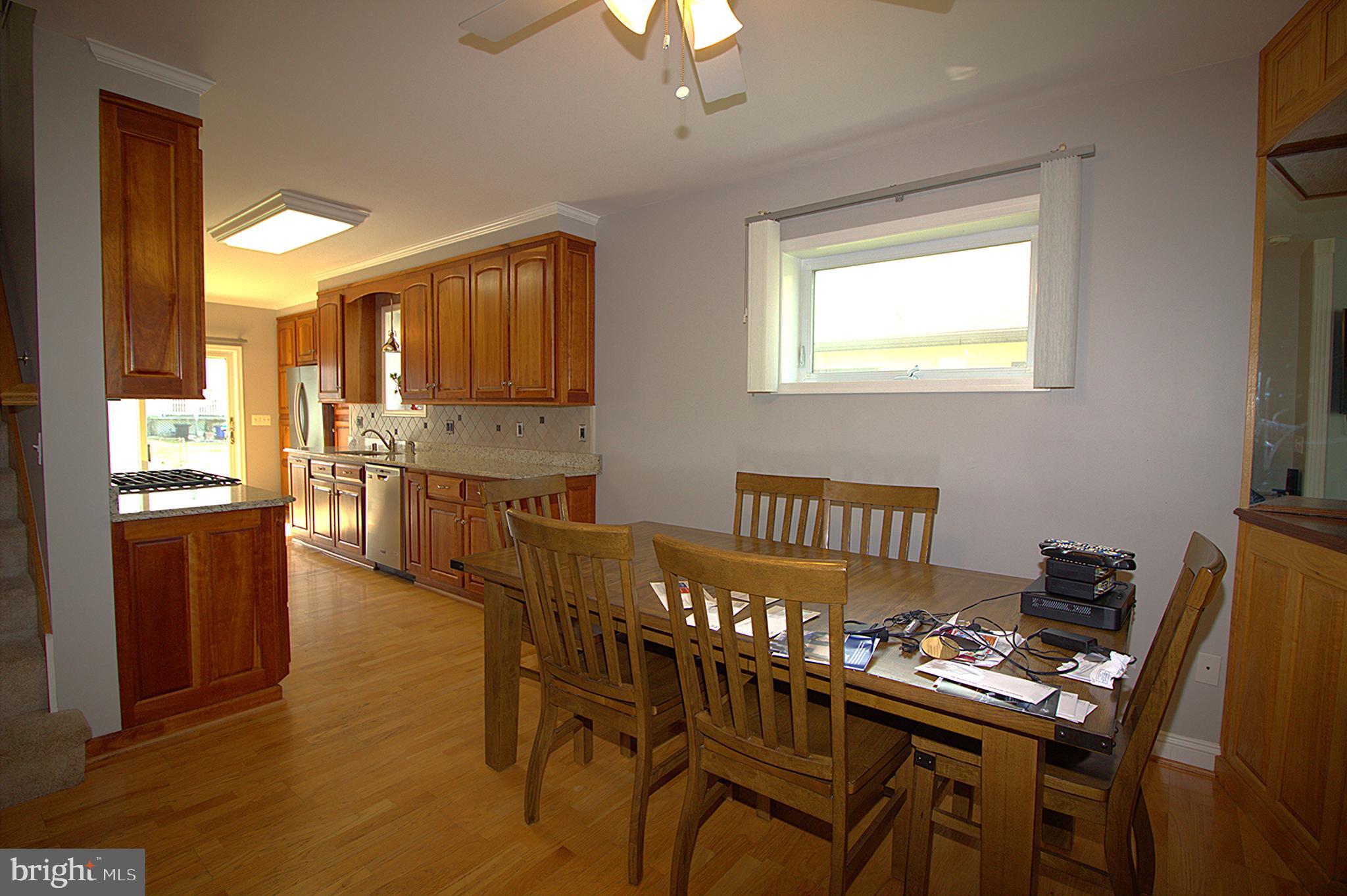 2919 Ritchie Avenue Baltimore, MD 21219 - Photo 9 of 24 a view of a dining room with furniture window and outside view