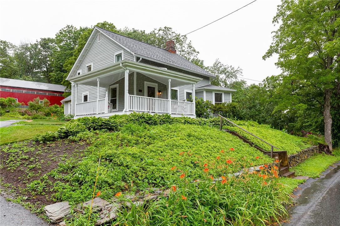 723 Traver Road Pleasant Valley, NY 12569 - Photo 1 of 1 a front view of house with yard and green space