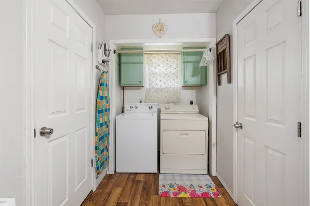 a storage room with a window and washer