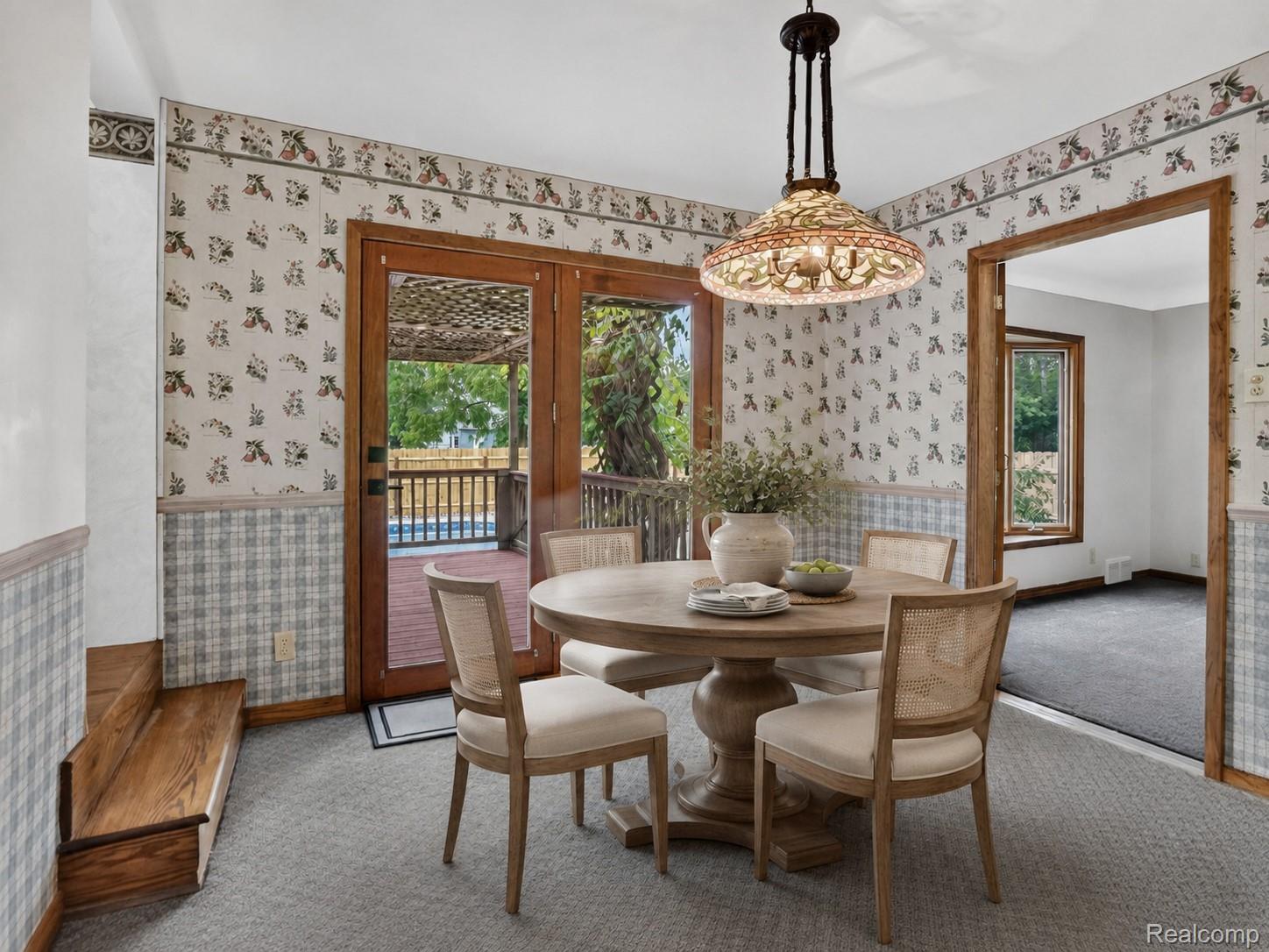 1437 East Cook Road Grand Blanc, MI 48439 - Photo 49 of 69 Dining area featuring carpeted flooring and patterned wallpaper
