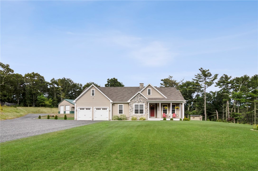 Beautifully situated on 3 acre lot with unerground sprinklers  Vinly impression shingles with real stone and trex front porch