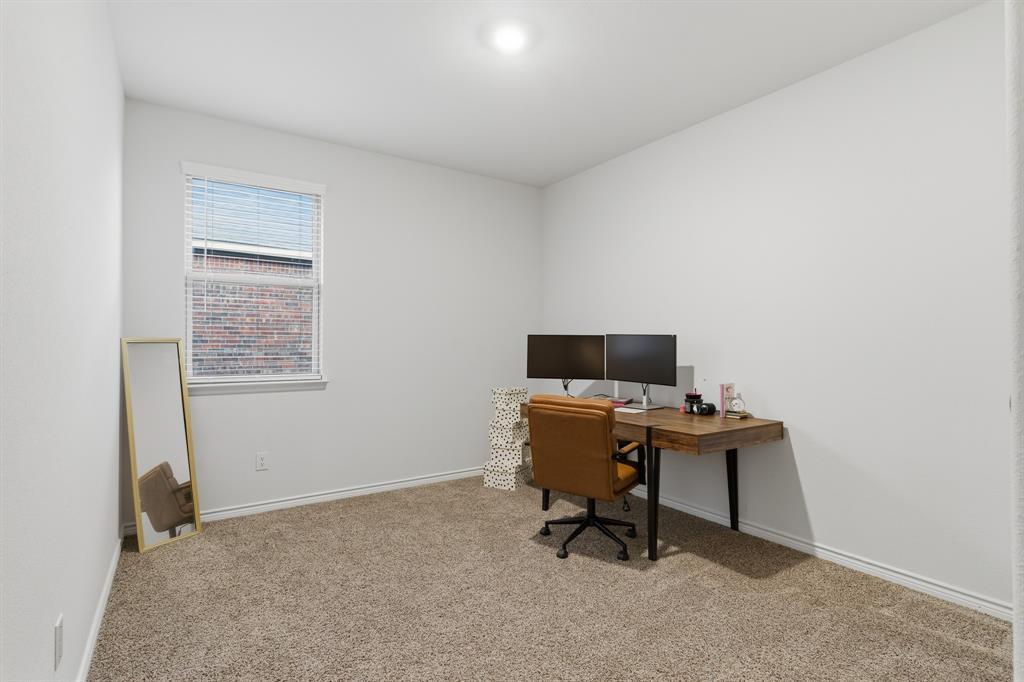 727 Fort Lane Fate, TX 75189 - Photo 17 of 19 a work room with furniture and a window