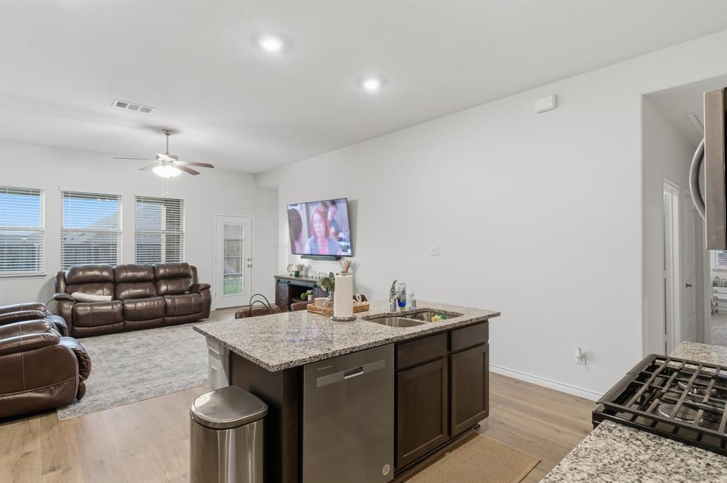 727 Fort Lane Fate, TX 75189 - Photo 9 of 19 a living room with furniture and a couch