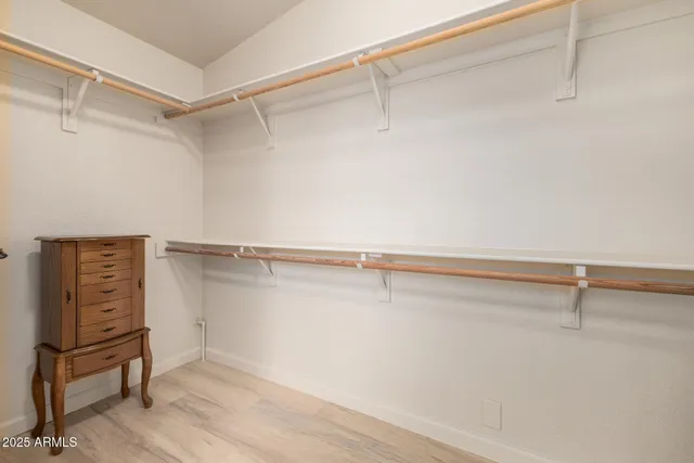 a view of a room with racks on the wall
