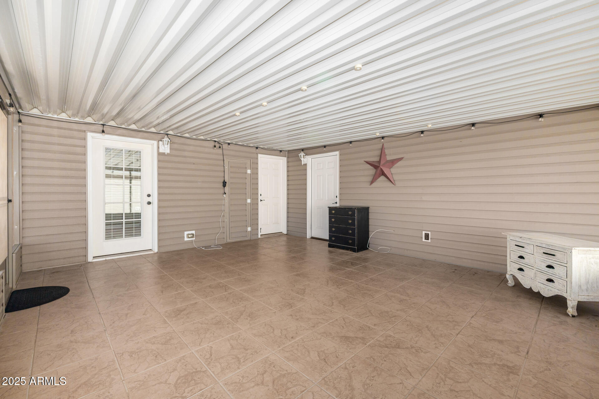 3301 South Goldfield Road, Unit 4018 Apache Junction, AZ 85119 - Photo 34 of 45 a view of livingroom with an empty space