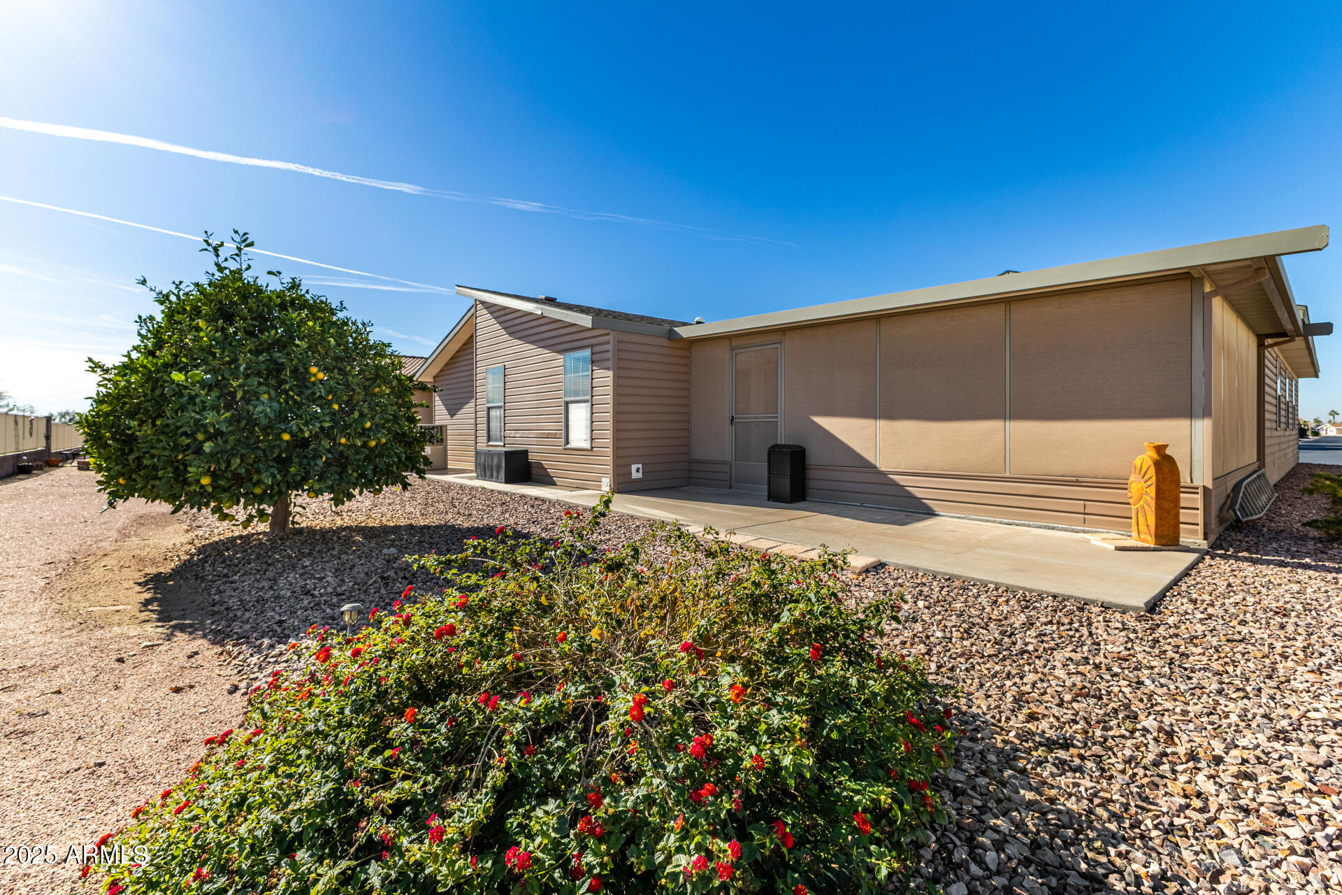 3301 South Goldfield Road, Unit 4018 Apache Junction, AZ 85119 - Photo 36 of 45 a house view with a outdoor space
