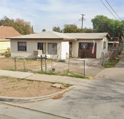front view of a house with a patio