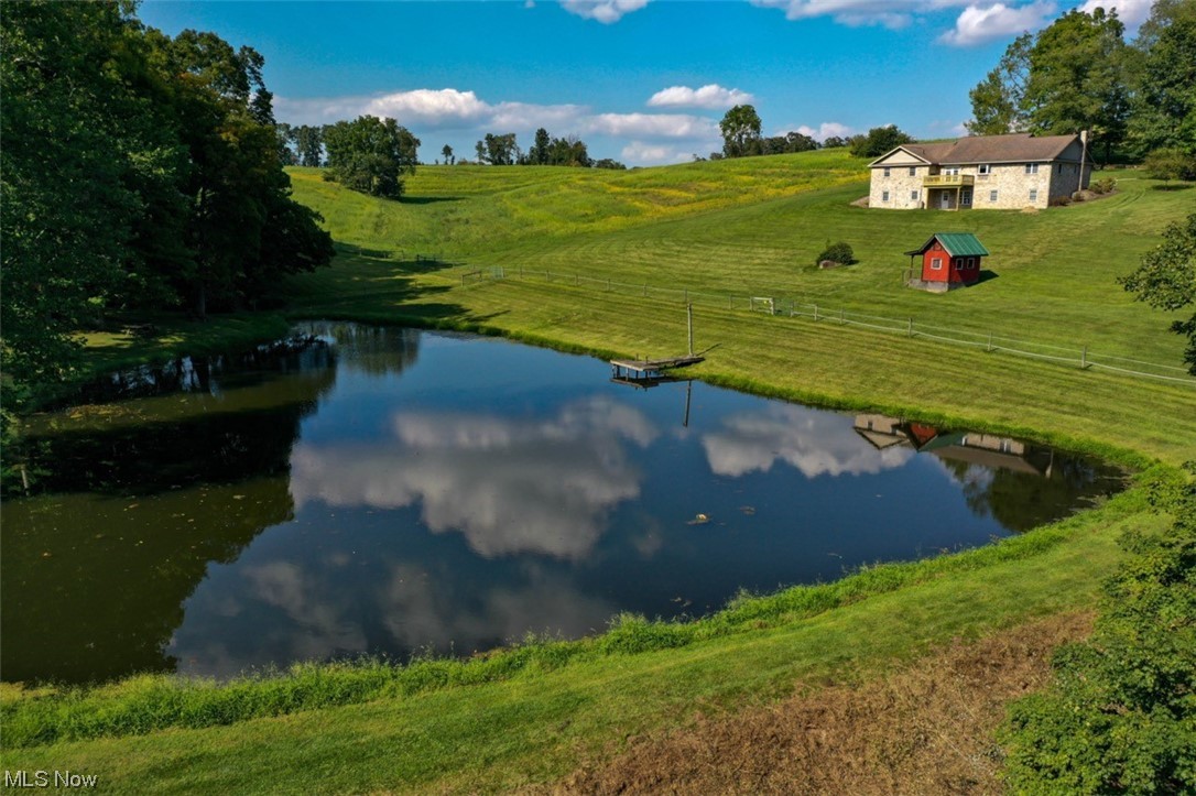 8215 Rochester Road East Rochester, OH 44625 - Photo 8 of 34 View of pond